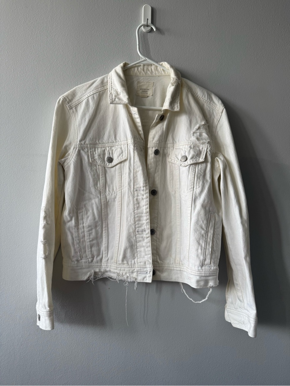 American Eagle Outfitters Off-White Distressed Denim Jacket